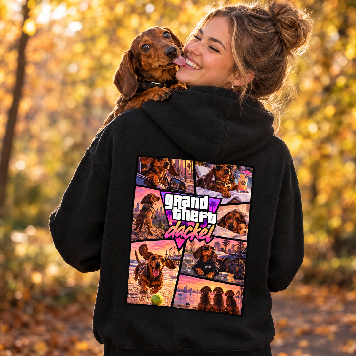 Frau mit Dackel im Herbstpark im Hoodie grand theft dackel